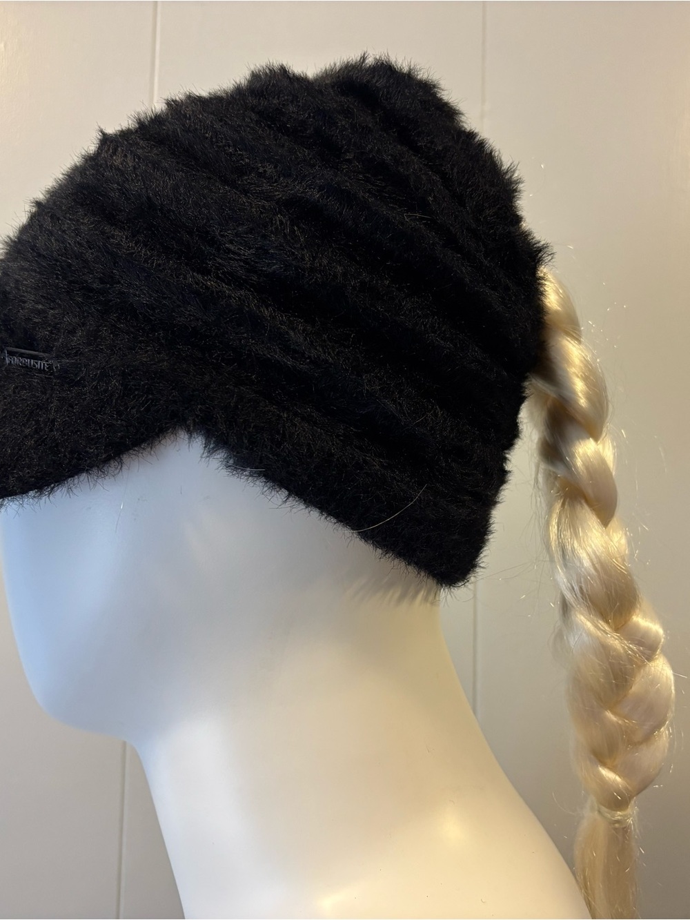 Cozy Black Faux Fur Beanie with Ponytail Slot. Newspaper boy brim.